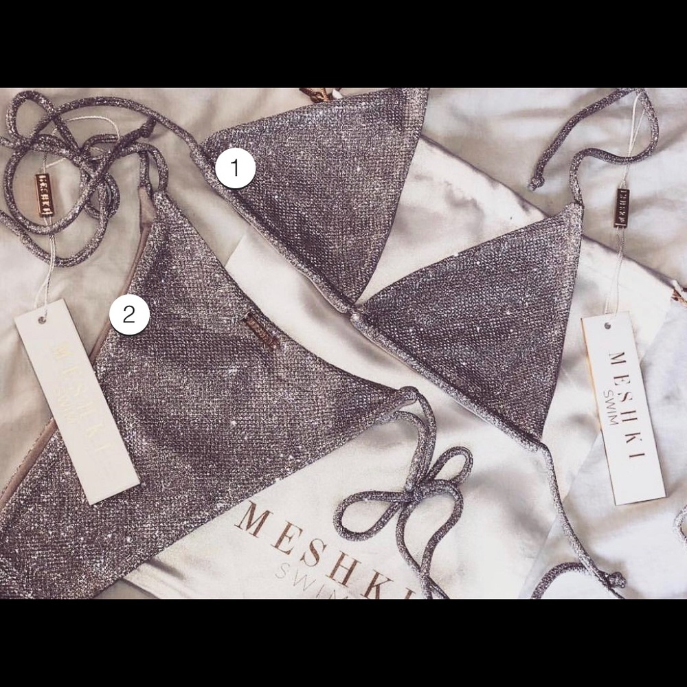 Brand new. Worn only to take pics. Silver bikini